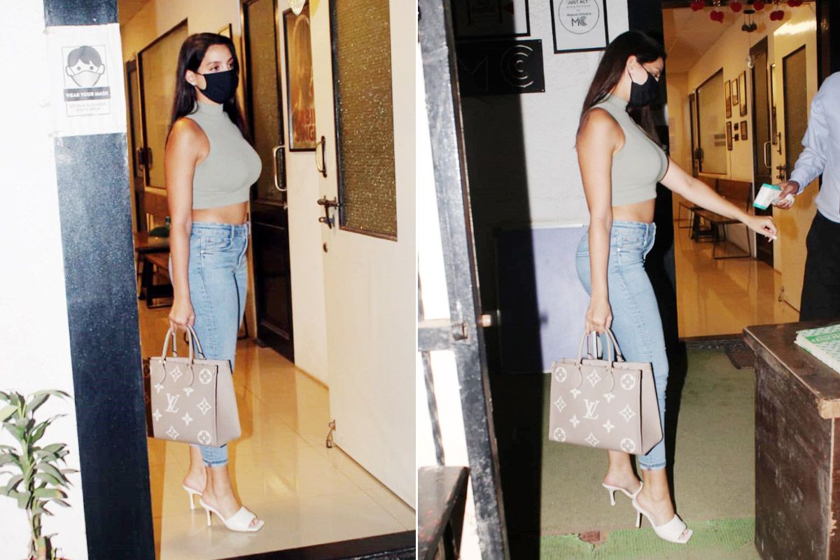 Nora Fatehi Pairs Rs 2.5 Lakh Bag With Chic Crop Top And Denim| View Photos