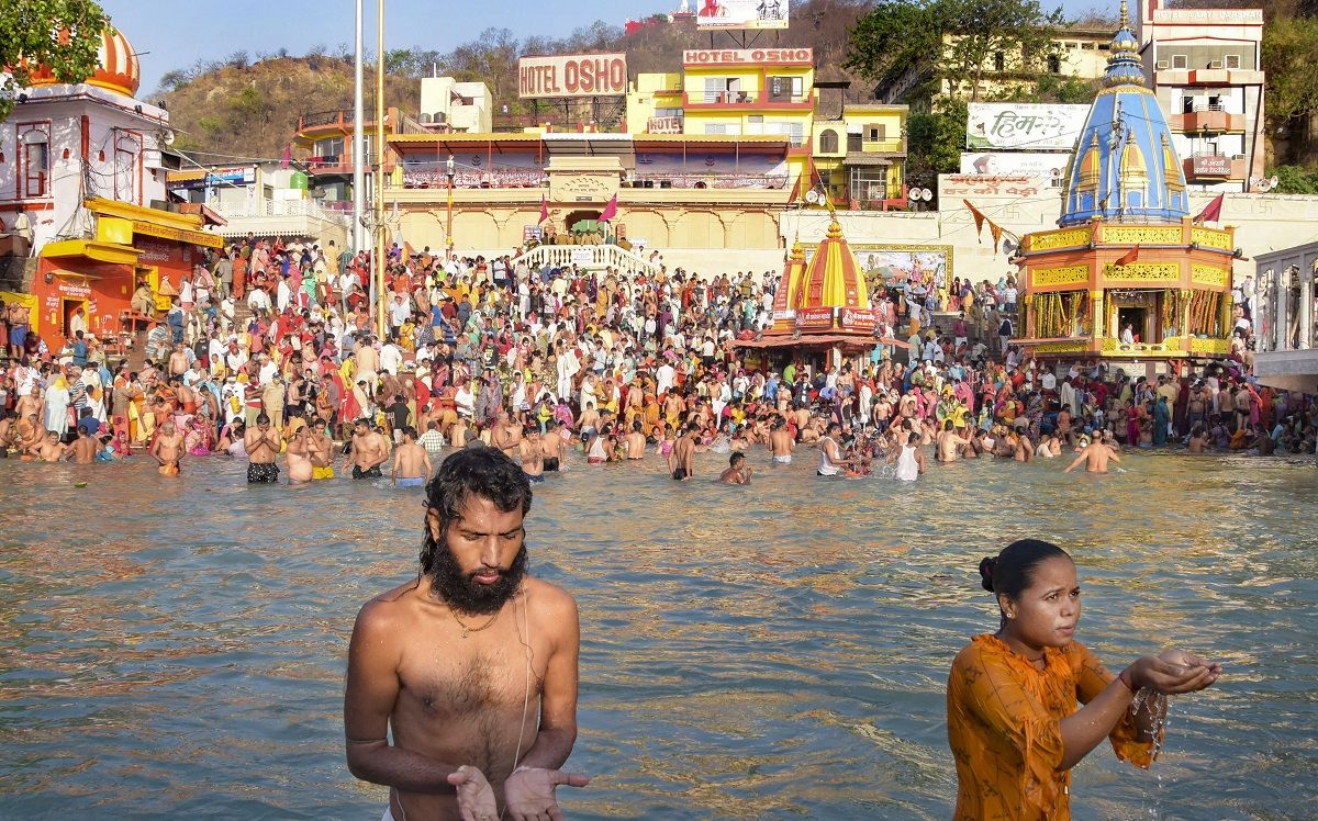 Devotees take the holy dip in Ganga