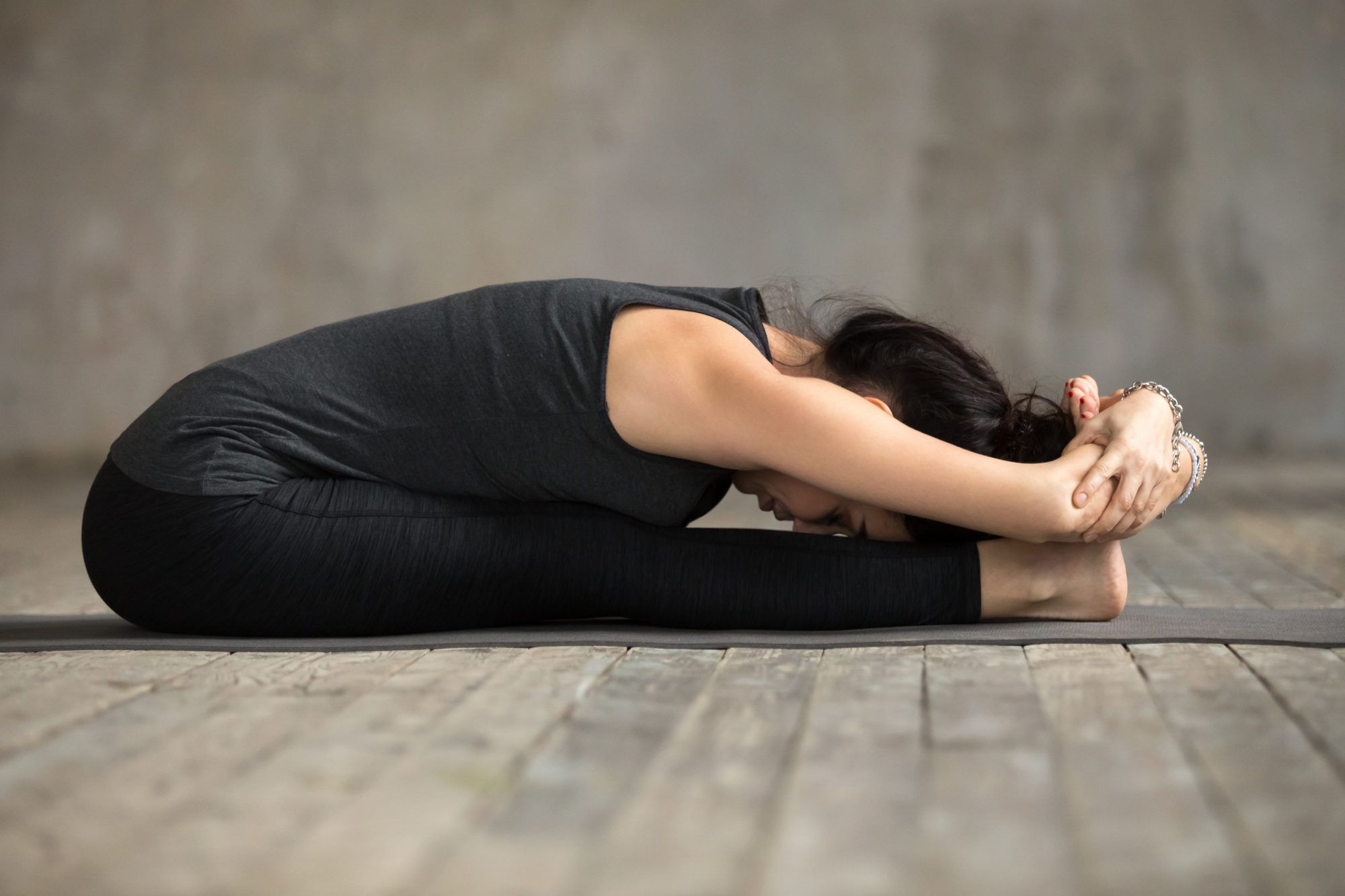 Benefits of Viparita Karani or Legs-Up-The-Wall Pose - Yoga Central