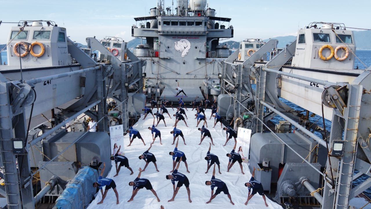 Indian Navy personnel, onboard INS Airavat and deployed at Cam Ranh Bay in Vietnam, perform Yoga