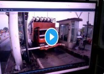 Truck Loaded With People On Top Gets Smacked by Barrier at Toll Plaza.  Watch Funny Viral Video