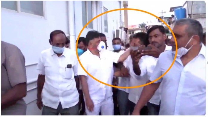 Caught On Camera Karnataka Congress Chief Slaps Man For Trying To Put Arm Around Him Faces