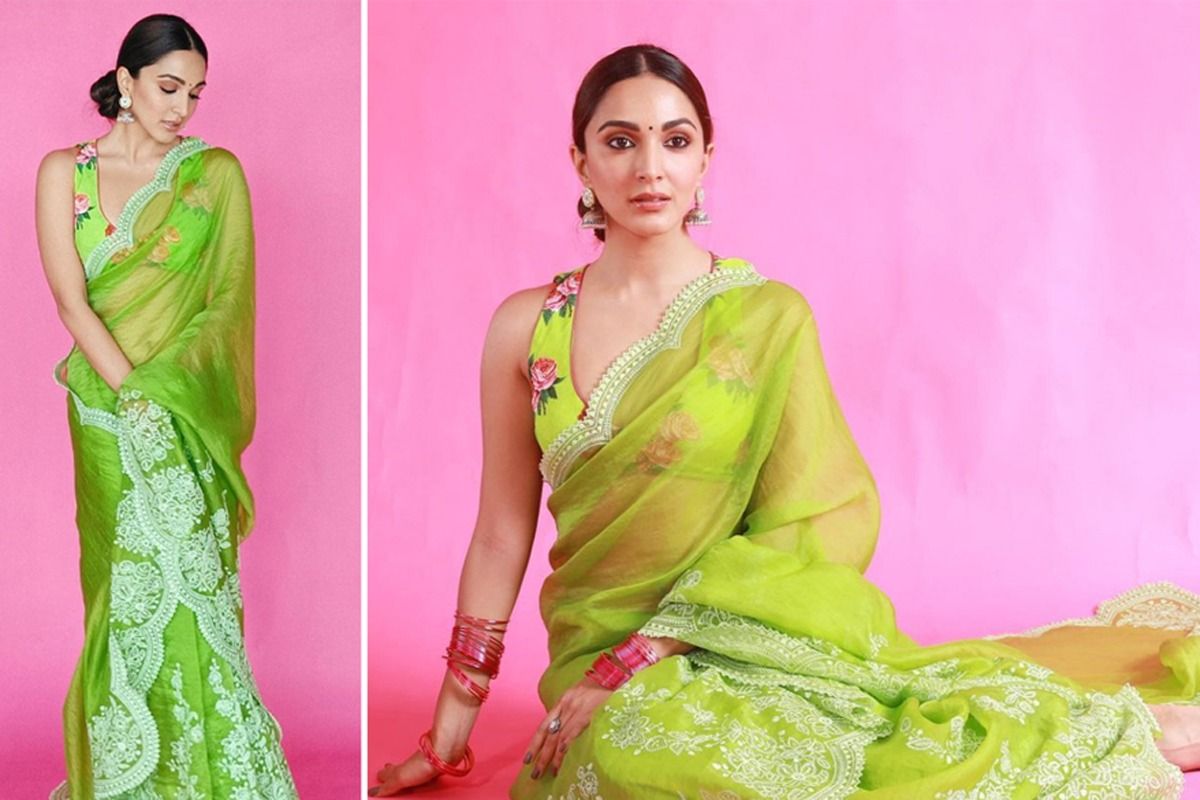 A glam Sea Green Soft Banarasi Silk Saree With Adoring Blous