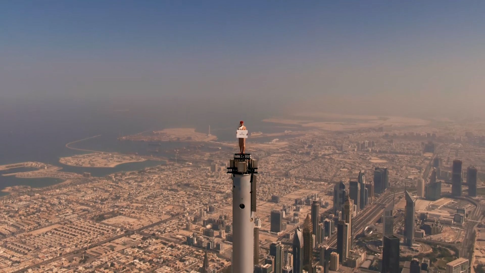 Emirates Ad Of Woman Standing On Top Of Burj Khalifa Is So Real Watch Emirates Ad Of Woman Standing On Top Of Burj Khalifa Is So Real Watch