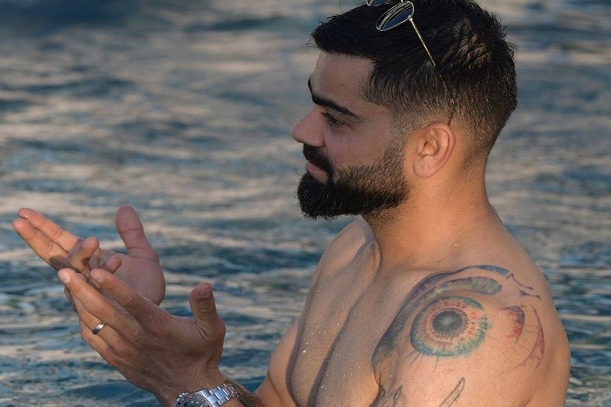 Virat Kohli News Virat Kohlis Shirtless Photo During Rcbs Pool Session Is A Hit On Twitter 2155