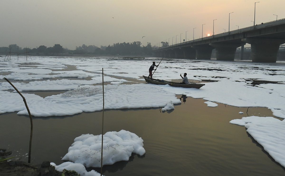 Delhi Govt Uses Boats Ropes Sprinkles Water To Remove Toxic Foam From Yamuna River Watch