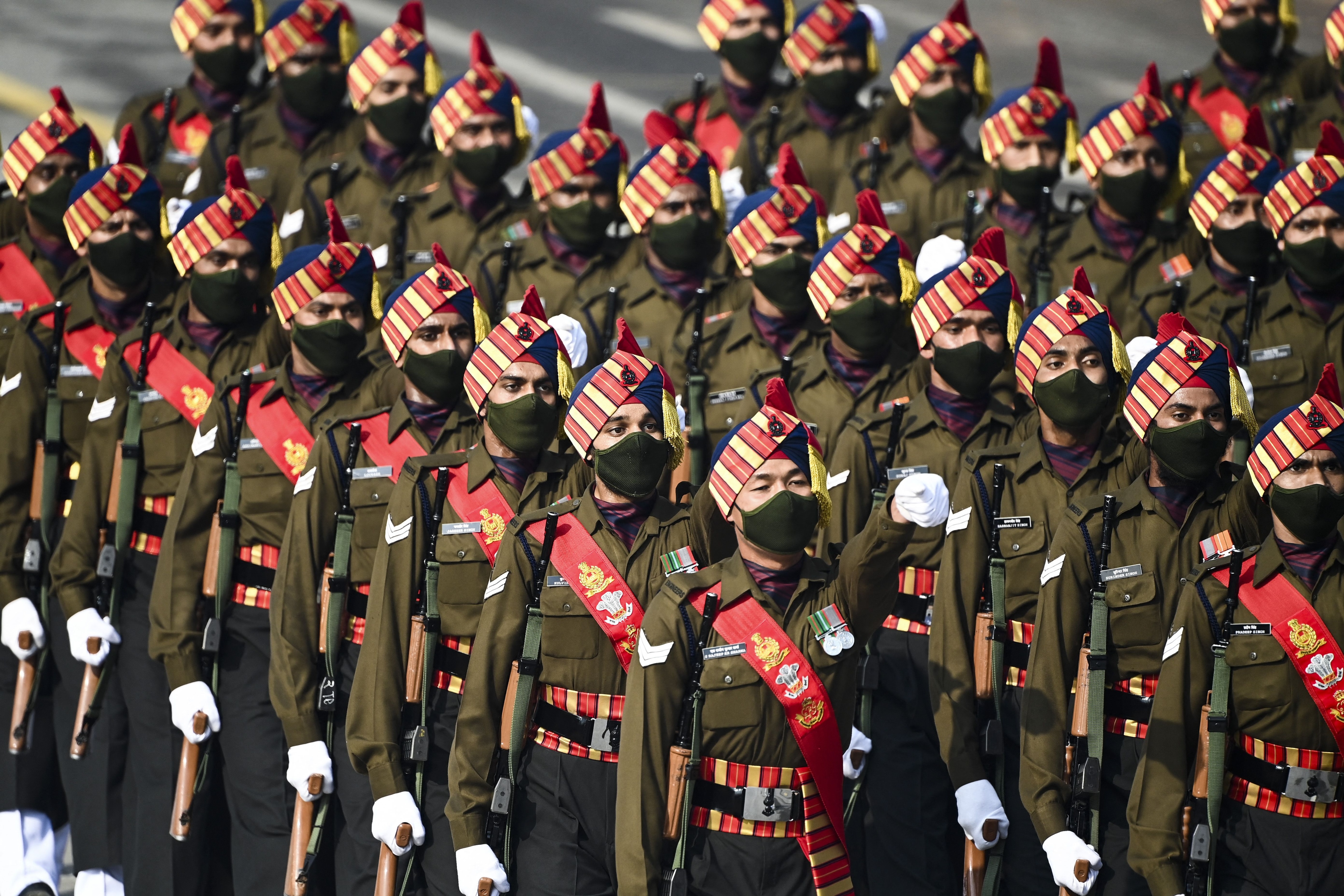 Soldiers march along Rajpath during the Republic Day parade in New Delhi on January 26, 2021. (AFP photo)