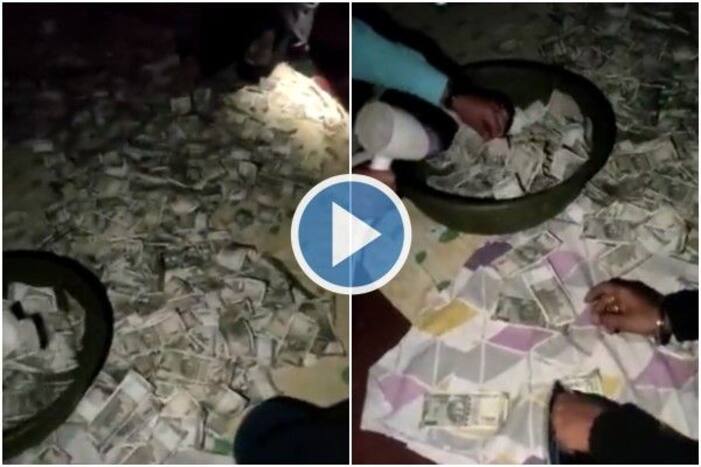 1 Crore Cash Found In Water Tank During Raid, IT Dept Officials Use Iron & Hair Dryer to Dry Currency Notes | Watch