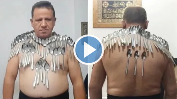 Iranian Man Balances 85 Spoons On His Body, Sets Guinness World Record