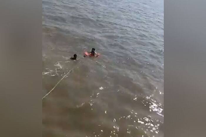 The woman lost control and fell into the water after a strong ocean current hit her boat.