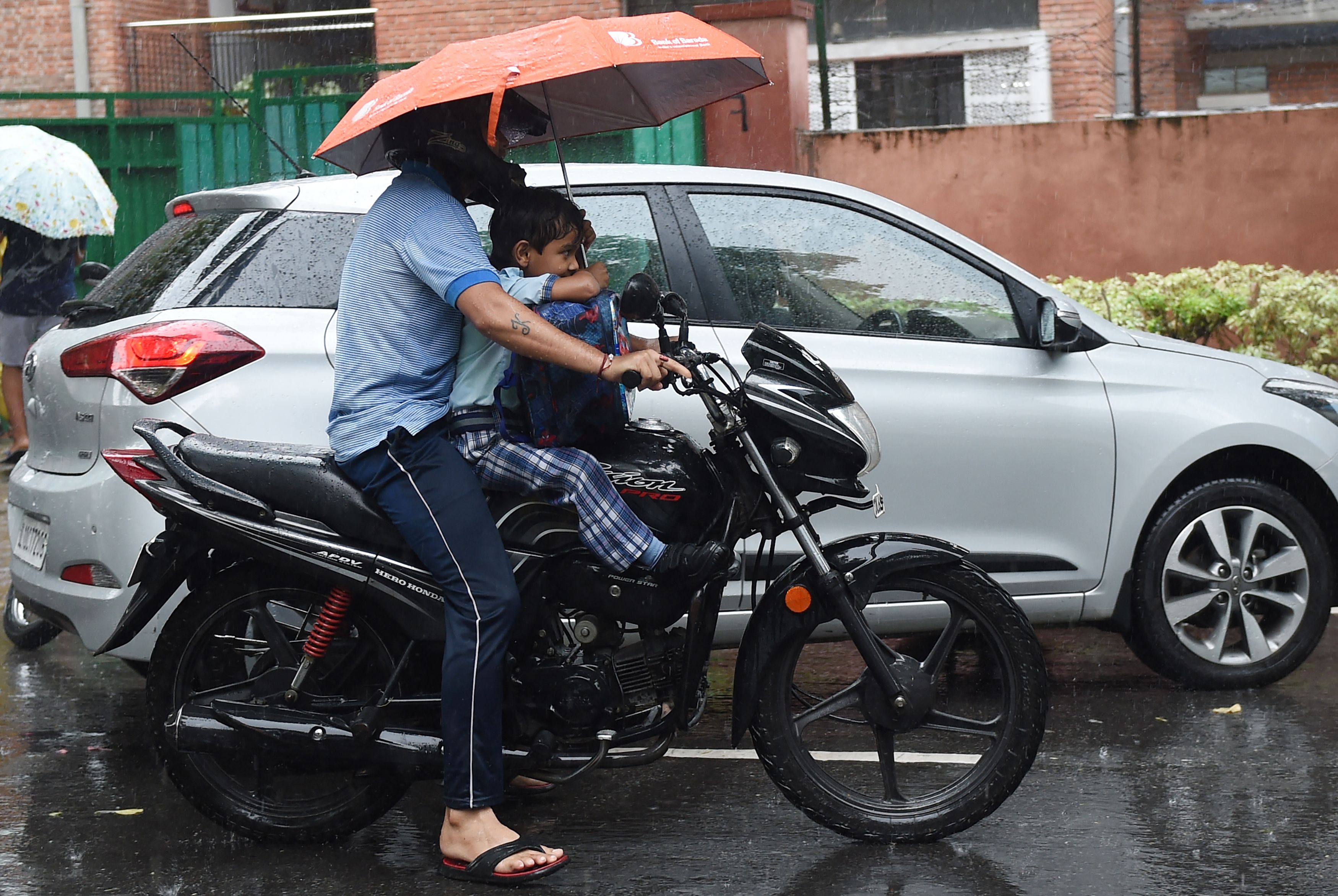 Helmet Mandatory For Kids Riding Pillion on TwoWheelers; Violators To