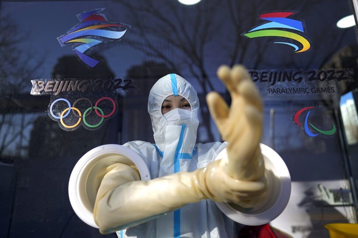 2022 Winter Olympics: A worker getting ready to conduct a Covid-19 Test at the Olympics village on on Tuesday, Feb. 1, 2022, in Beijing.