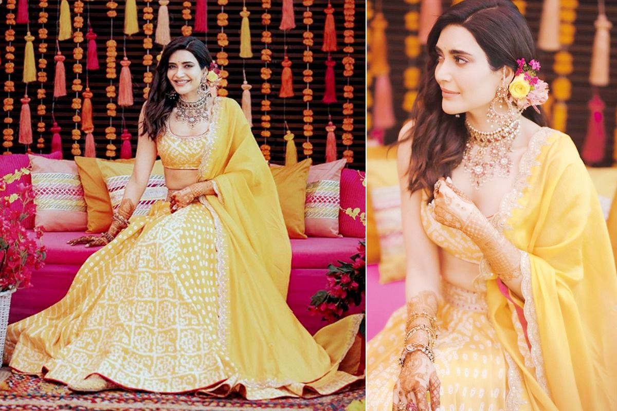 Buy Harlow yellow lehenga with a blouse and dupatta.