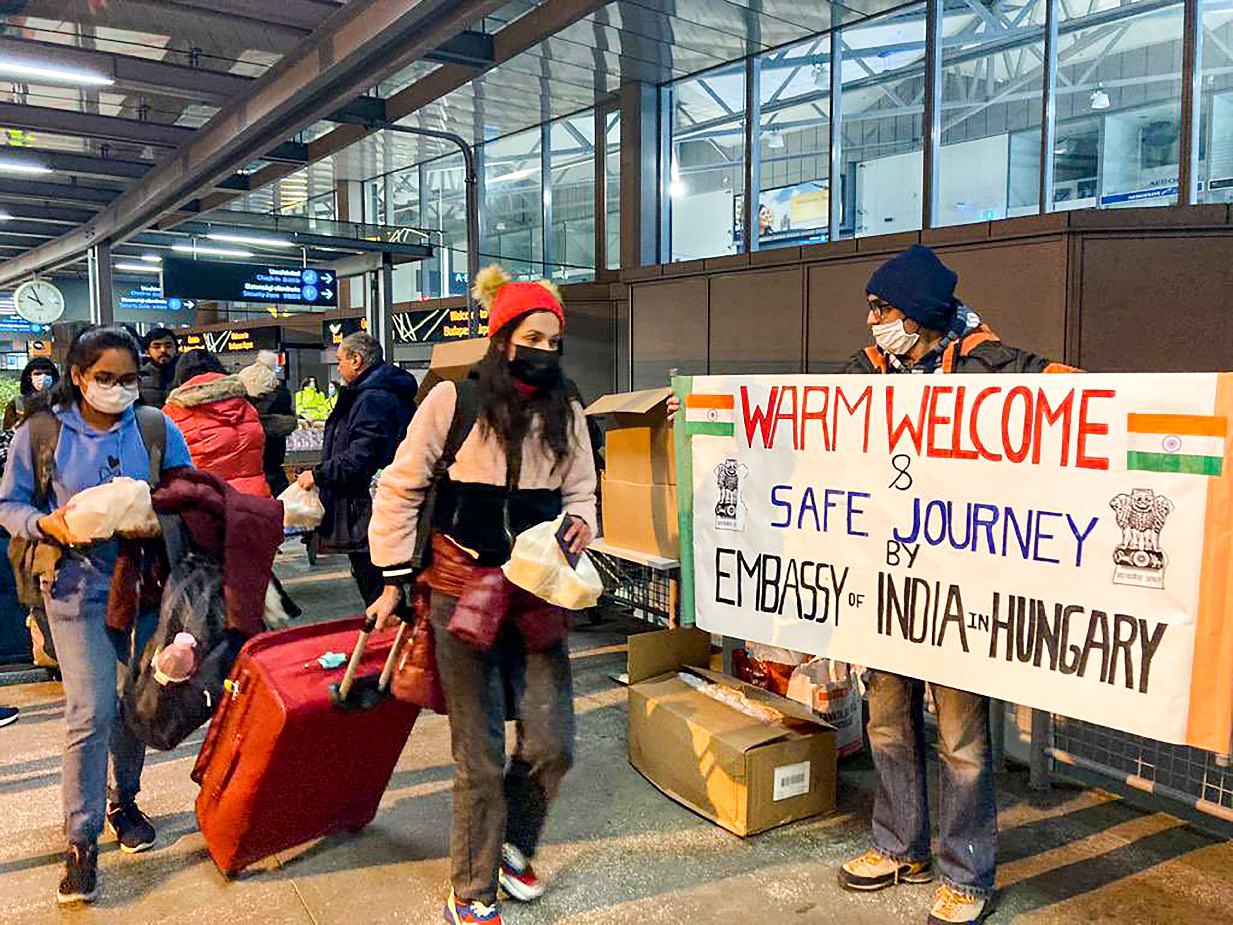 Indian nationals board a special Air India flight, evacuating Indians from war-torn Ukraine, in Budapest. (PTI Photo)