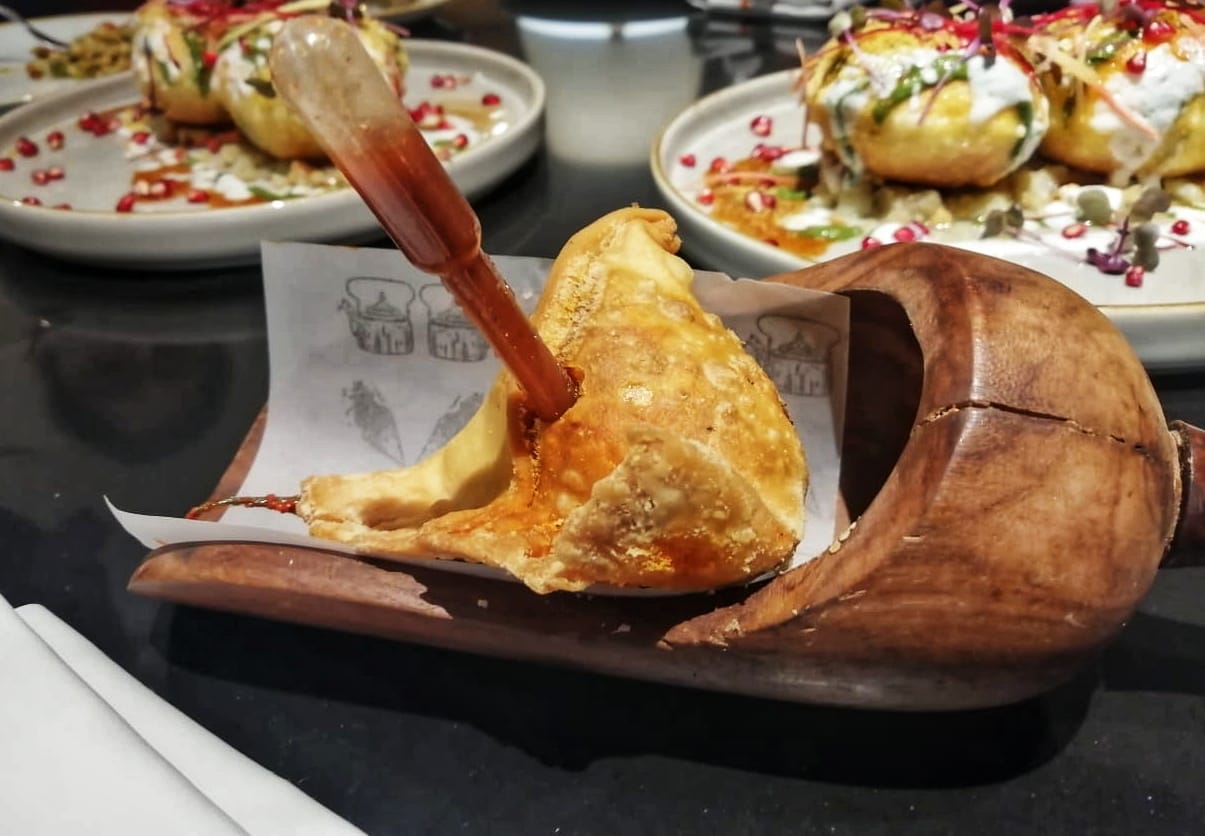 Butter chicken samosa.