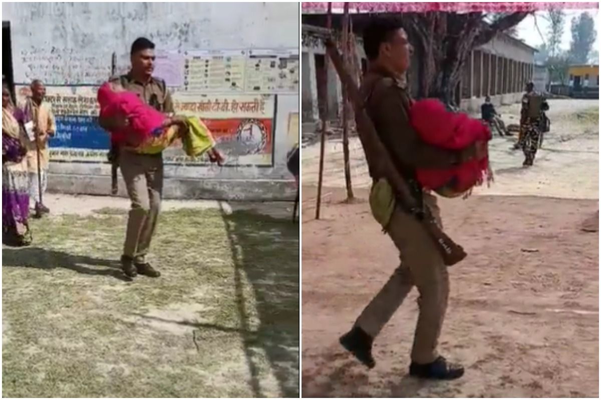 UP Cop Carries Elderly Woman to Poll Booth in His Arms, Wins Hearts