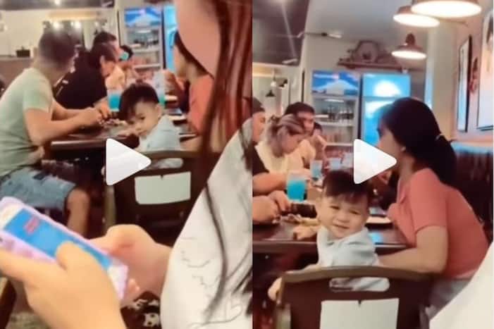 Viral Video: Little Boy Stares at Pretty Woman, Smiles After Getting Caught. Watch