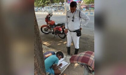 Kolkata Traffic Cop Mentors 8-Year-Old Boy While Managing Traffic, Hailed As 'Hero'