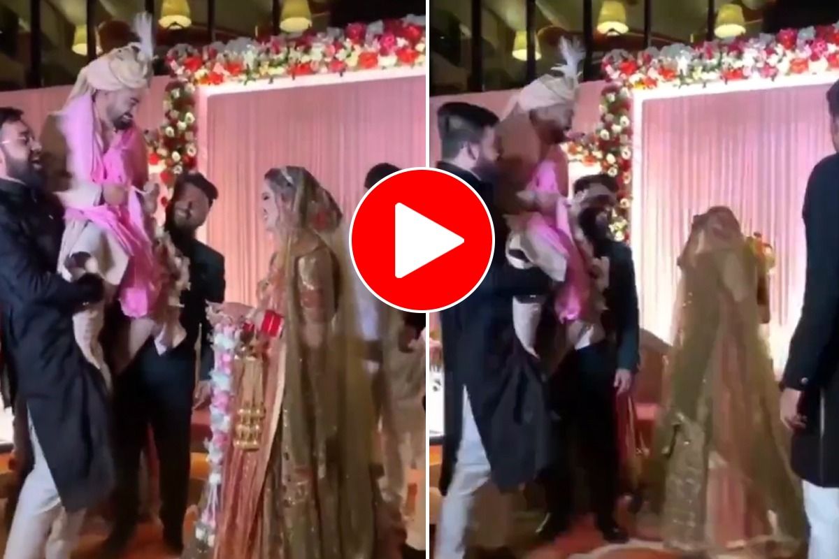 Viral Video Groom Tries to Dodge Jaimala, Bride Reacts in The Funniest