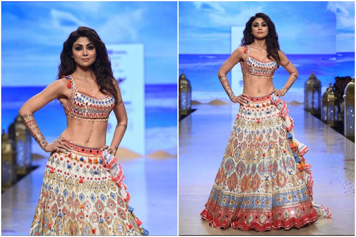 Shilpa Shetty flaunted her desi sass as she wore the stunning lehenga with an ivory background featuring blue and crimson flecks.