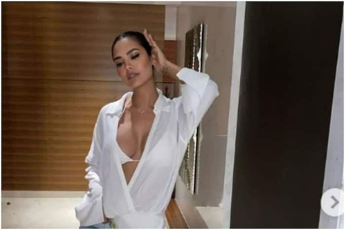Esha Gupta Goes Bold in White Transparent Super Plunging Neckline Dress – HOT PHOTOS