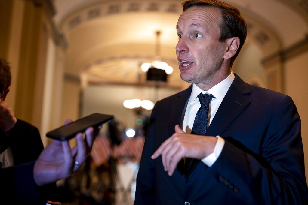 Sen. Chris Murphy, D-Conn., who has led the Democrats in bipartisan Senate talks to rein in gun violence, pauses for questions from reporters, at the Capitol in Washington, Wednesday, June 22, 2022.