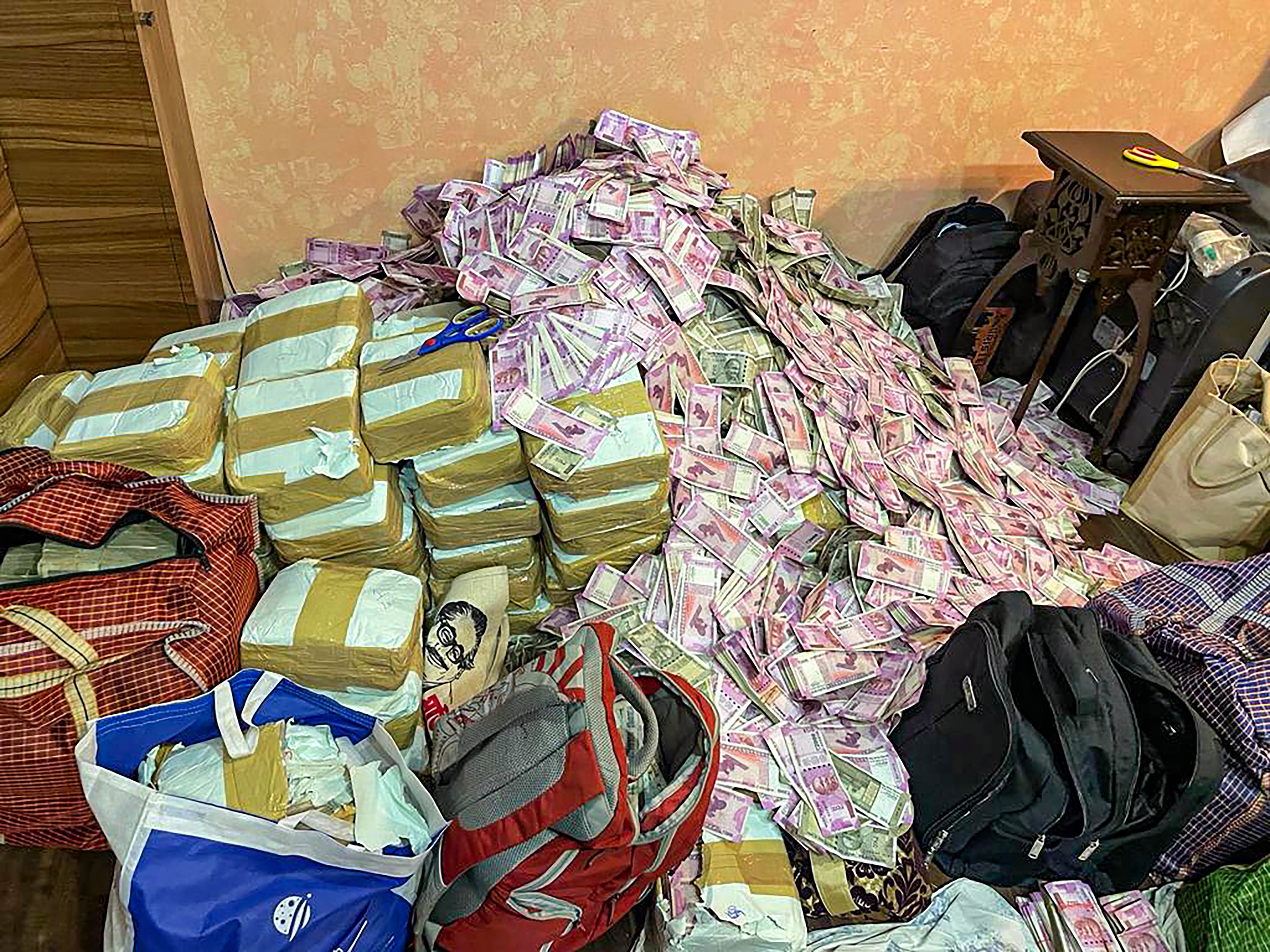 Rs 20 crore cash seized by ED from the premises of an aide of West Bengal minister Partha Chatterjee after the agency conducted raids on Friday. (PTI Photo)