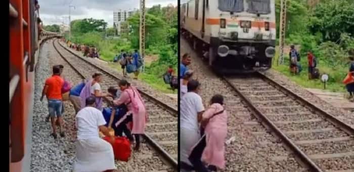 Viral Video: Woman Almost Crushed By Train While Crossing Tracks to ...