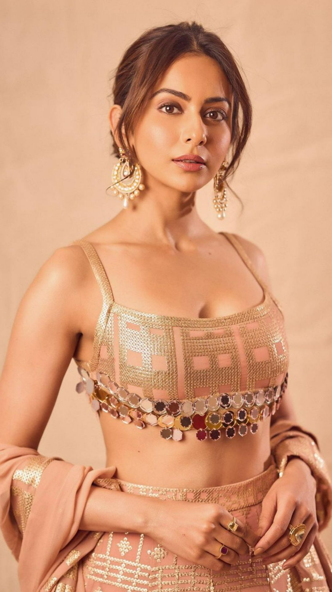 Priyanka Chopra's peach designer lehenga came with a must-see backless  blouse | VOGUE India