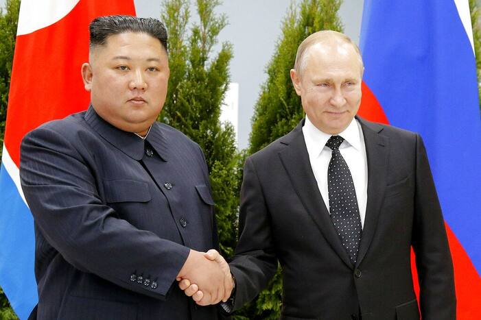 Russian President Vladimir Putin, right, and North Korea's leader Kim Jong Un shake hands during their meeting in Vladivostok, Russia.