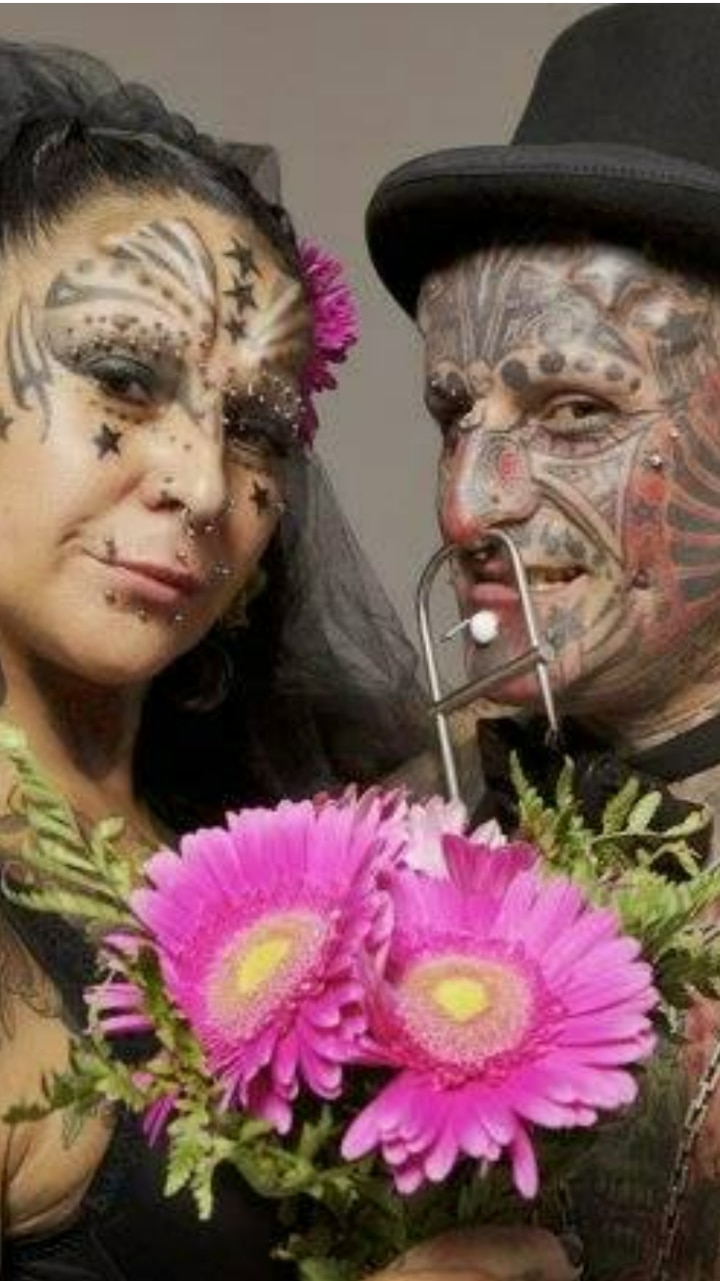 Couple Sets World Record For Most Body Modifications