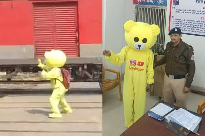 Teddy Godfather dancing at railway crossing
