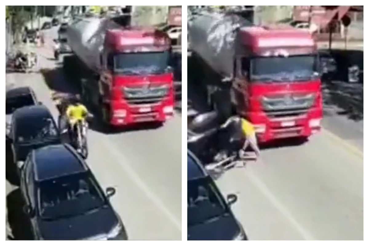 Viral Video Biker Gets Knocked Off By Errant Car Driver Gets Run Over By Tanker Crawls Out Watch