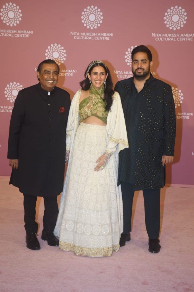 Shloka Mehta poses with husband Akash Ambani and father-in-law Mukesh Ambani 