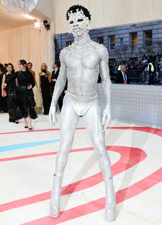 Lil Nas X outfit's included a full-body armored suit and metallic thong (Credits: AFP)