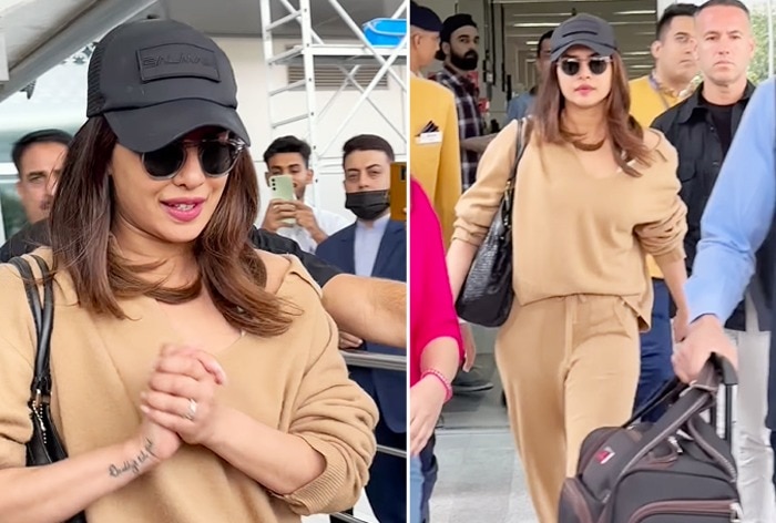 Priyanka Chopra begrüßt Paparazzi am Flughafen Delhi im Vorfeld der Verlobung von Parineeti Chopra-Raghav Chadha