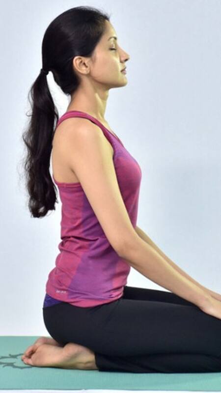 8 Yoga Asanas That Can Help With Hair Growth