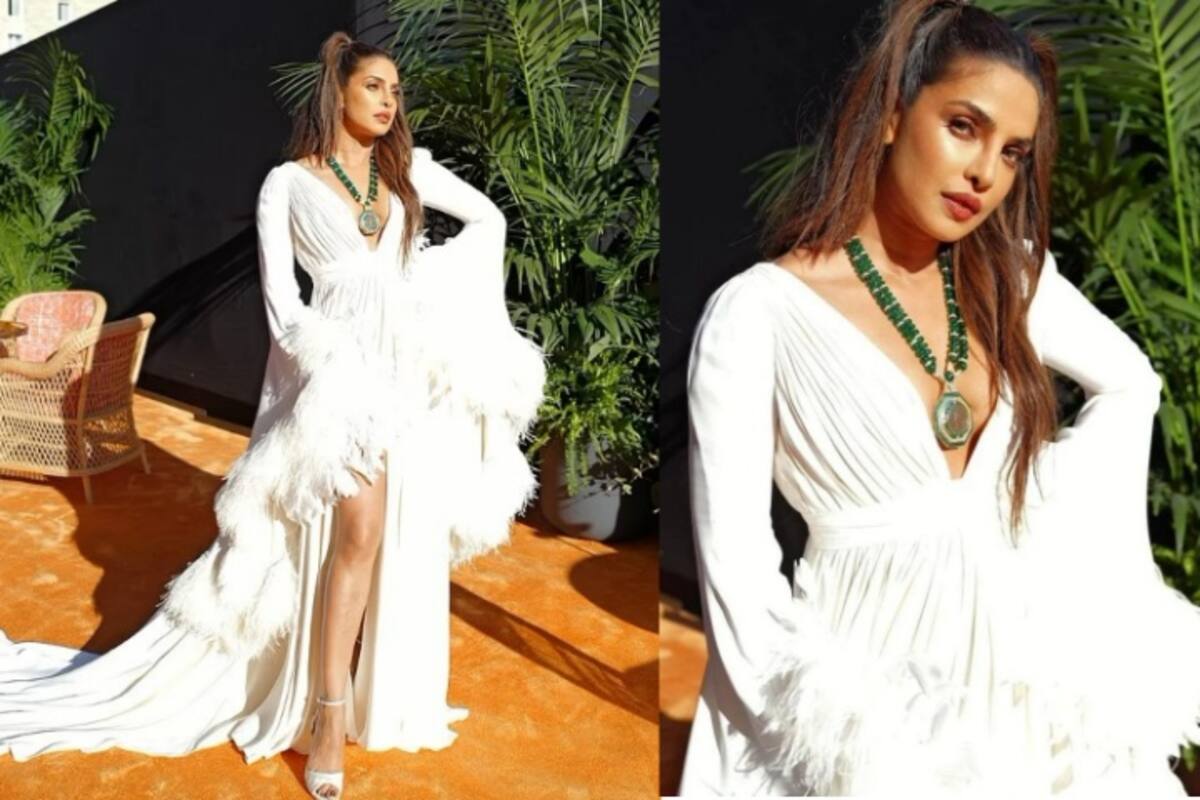 1200px x 800px - Priyanka Chopra Looks Like The Sexiest Cat Woman in White Slit Gown With  Plunging Neckline - See Photos