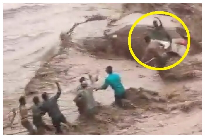 Read more about the article Woman Driven Car Swept Away Amid Heavy Rain In Haryana Rescued By Locals Video Surfaces