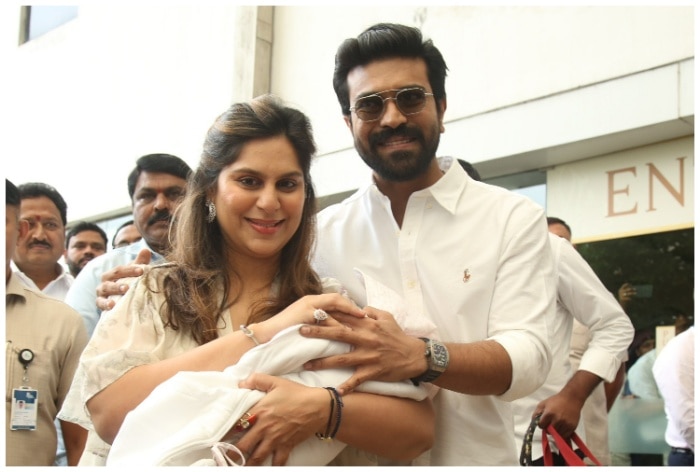 Ram Charan-Upasana Konidela Greeted With Rose Petals as They Step Out of Hospital With Baby Daughter, Watch