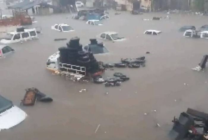 Cars Submerged, Inundated Neighbourhoods And Destroyed Roads In Gujarat ...