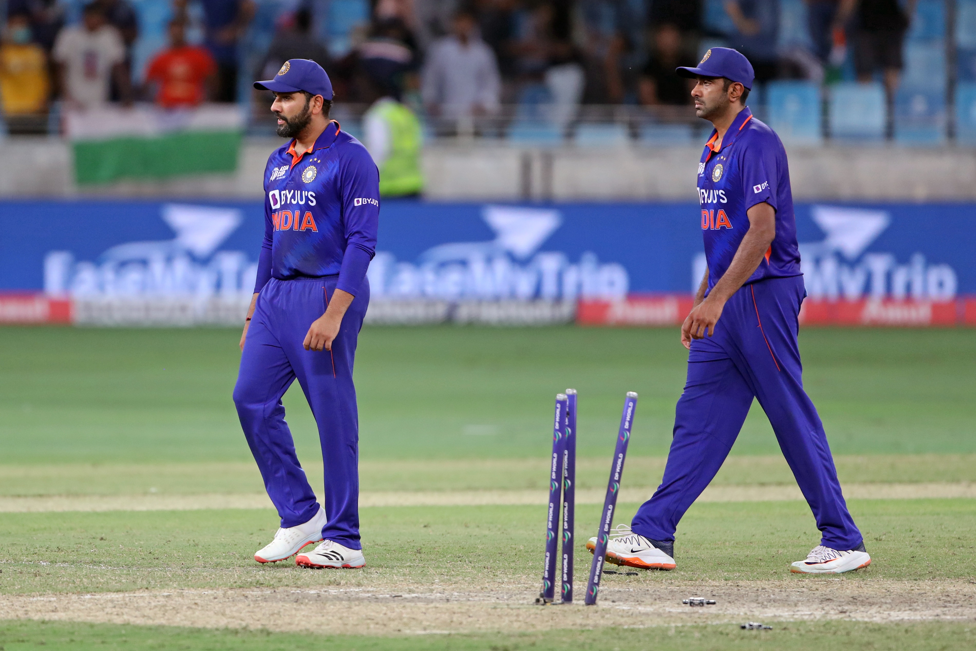 India's Rohit Sharma and  Ravichandran Ashwin after losing  the Asia Cup Super Four match against  Sri Lanka at the Dubai International Cricket Stadium in Dubai on Tuesday. (ANI Photo)