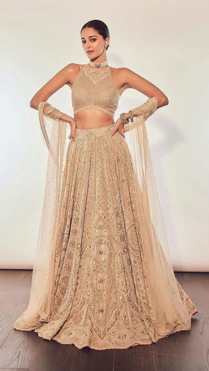 Buy Hazelwood Gold Lehenga And Crop Top With A Long Back And 3D Floral  Embroidery Online - Kalki Fashion