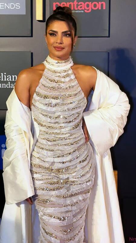 green emerald velvet dress Priyanka Chopra 2023 Met Gala Black Strapless Slit Dress main image 1