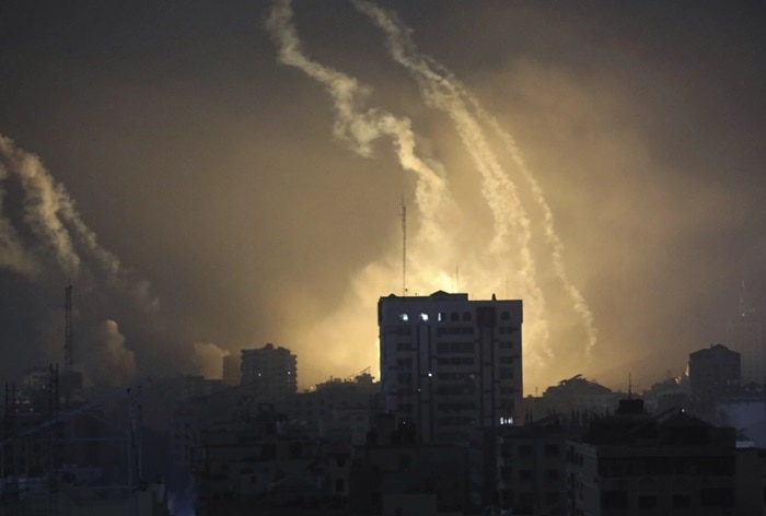 Smoke and explosions caused by Israeli bombardment are seen on the horizon in northern Gaza, Saturday Oct 28 (AP)