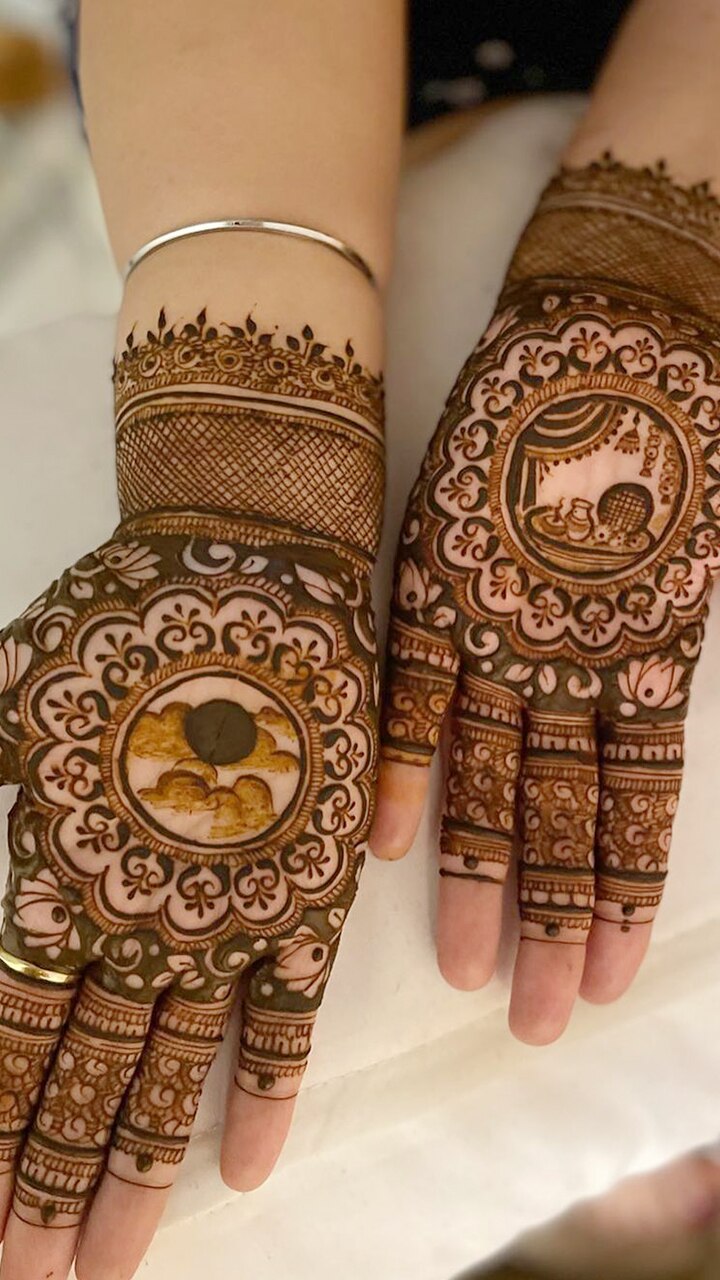 Beautiful woman dressed up as Indian tradition with henna mehndi design on  her both hands to celebrate big festival of Karwa Chauth, Karwa Chauth  celebrations by Indian woman for her husband 17458115