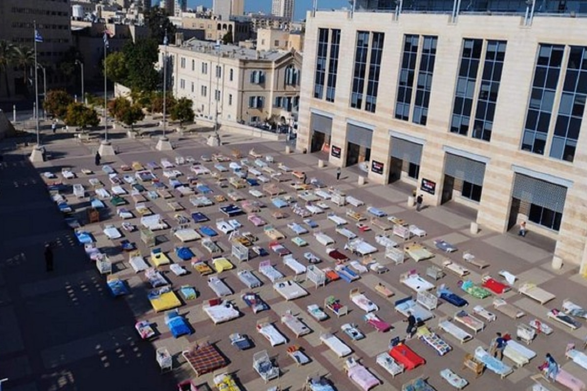 The exhibit of empty beds in Safra Square in Jerusalem remains open to the public until November 1.