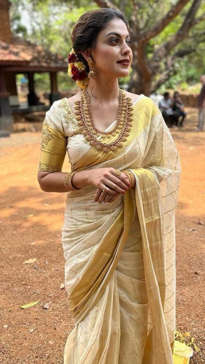 A simple kerala hindu bridal makeover in a pristine golden kasavu saree and  tradtional kerala ornaments . Muse : @taachhi Photography: @... | Instagram