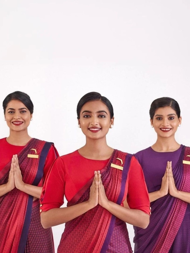 Air India unveils new uniforms for cabin, cockpit crew designed by fashion  designer Manish Malhotra | Zee Business