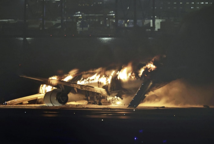 Massive Fire Breaks out in Plane on Runway of Tokyo Haneda Airport in Japan